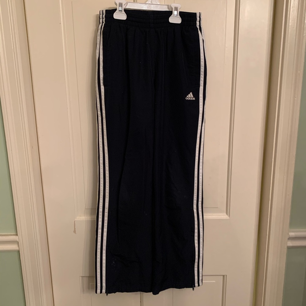 Adidas black track pants with signature 3 stripes